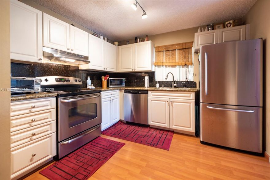 Welcome to your dream condo! This stunning property features 3 spacious bedrooms, 2 bathrooms, and a community pool for endless summer fun. The interior boasts beautiful wood flooring throughout, creating a warm and inviting atmosphere. With a brand-new roof, you can rest easy knowing that this home is not only beautiful but also well-maintained. Don't miss out on this incredible opportunity to own a piece of paradise. Whether you're looking for a permanent residence or a vacation getaway, this condo has everything you need and more. Schedule a showing today and make this condo your own before it's too late! Make an offer!