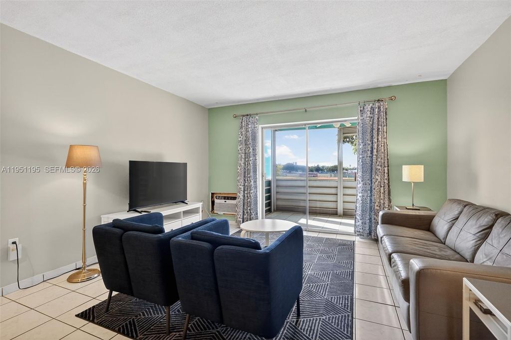 Photo of 17001 NE 13th Ave #201, Miami, FL 33162 (MLS # A11951195)