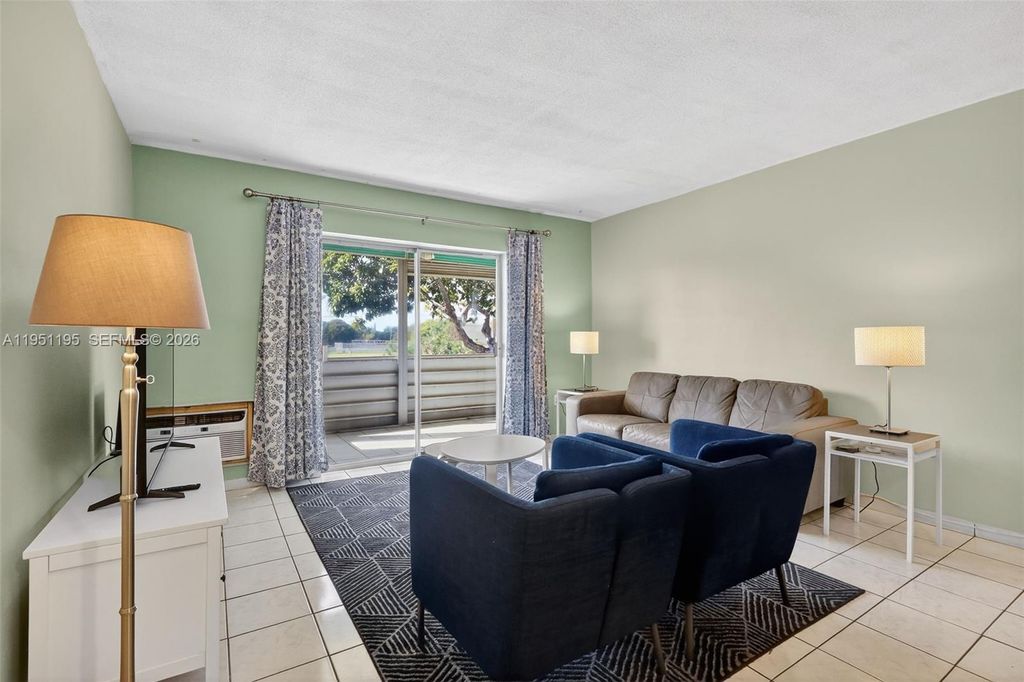 Photo of 17001 NE 13th Ave #201, Miami, FL 33162 (MLS # A11951195)