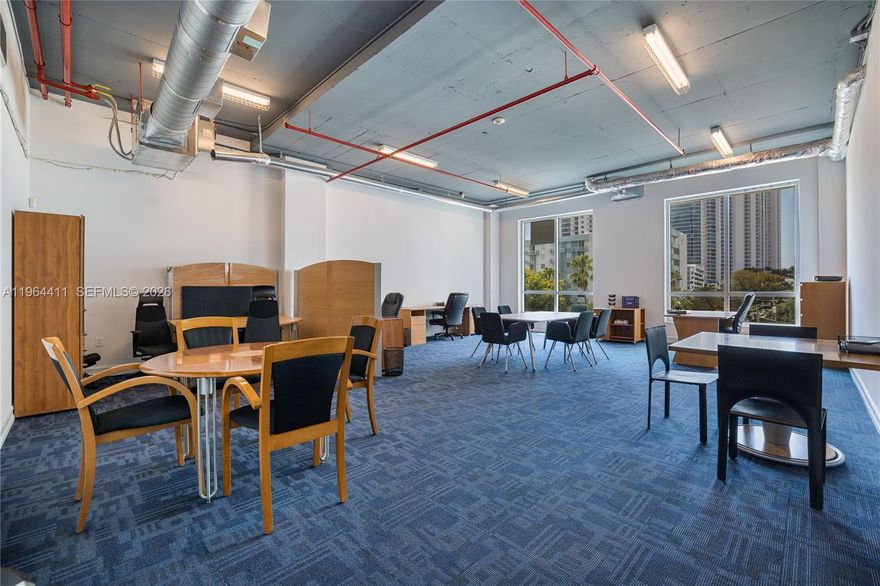 Great open space with high ceilings, large windows offering abundant natural light, in the heart of Miami's vibrant Edgewater neighborhood. Located in a mixed-use condo-office building with 24/7 security and a lobby, this private office gives flexibility with a minimum one-year lease, renewable. Can be combined with the adjacent suite of 576 sq ft (including 2 private offices). 
Furnished or unfurnished for longer leases. 
The price is all-inclusive except for electricity, internet, and tenant's insurance. The tenant can monitor its own A/C during extended business hours. 
Just a few blocks from Publix, Whole Foods, restaurants, cafes, and public transportation. Minutes from Wynwood, downtown, and Design District. Easy access to Miami International Airport, Brightline, and highways. This is really convenient for small and mid-sized businesses looking for a central, quiet, and convenient space.