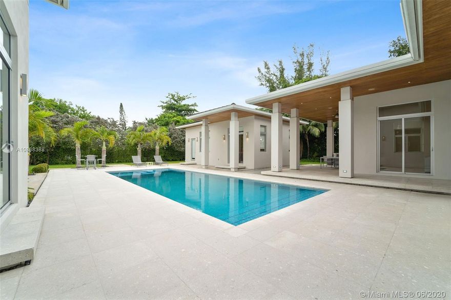 Brilliantly designed, Contemporary compound that exudes elegance & style.  Sought after one story design, this estate offers the majesty of high ceilings with the warmth of natural light. Classic entrance provides a welcome into the living areas with stunning views of the resort style pool/patio area. Accents of nature & brightness flow throughout creating a peaceful ambiance. Chef inspired kitchen with Mia Cucina design & top-tier appliances opens into the oversized family room complete with Onyx bar & show-stopper 700+ bottle glass encased wine cellar. Stunning indoor/outdoor Garden Living room complete with custom tile work & fireplace. State-of-the-Art smart technology includes Sonos Sound & Lutron Lighting.  Enormous patio features Summer kitchen, Guest House/Cabana & Basketball Court