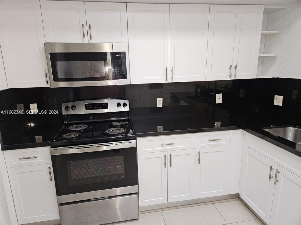 Photo of 1706 Belmont Ln #1706, North Lauderdale, FL 33068 (MLS # A11987746)