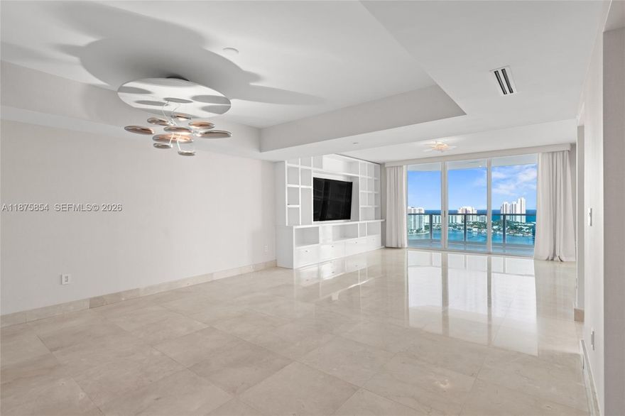 Stunning Penthouse at The Peninsula II in Aventura showcasing panoramic views of the ocean, Intracoastal and city skyline. This one-of-a-kind residence features soaring ceilings, dramatic floor-to-ceiling impact windows, and expansive private terraces that seamlessly blend indoor and outdoor living. The elegant primary suite boasts a spa-like bath with soaking tub, double vanities and oversized walk-in closets, complemented by two spacious bedrooms with en-suite baths and an additional room currently used as a bedroom
World-class resort-style living: 24-hour concierge, valet, 2 full-service spa, state-of-the-art fitness centers, tennis & pickleball courts, pools, children’s play area, dog park and more. Near Aventura Mall, marinas, golf and beaches delivering luxury, comfort & convenience