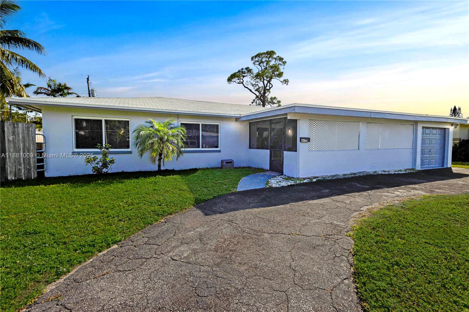 GREAT SHORT SALE OPPORTUNITY !!! ranch-style home in the heart of Coconut Creek. This spacious single-family home boasts 1,940 square feet of living space with 4 spacious bedrooms and 2 full bathrooms, all conveniently located on the main level. Situated on a 7,988 sqft lot with fenced yard and a circular driveway leading to the one-car covered carport, new roof (2 years old), impact windows on the front side, and updated garage. Text Listing Agent to schedule your private tour today! (24-hour notice required). ALL OFFERS BEING CONSIDERED !!!