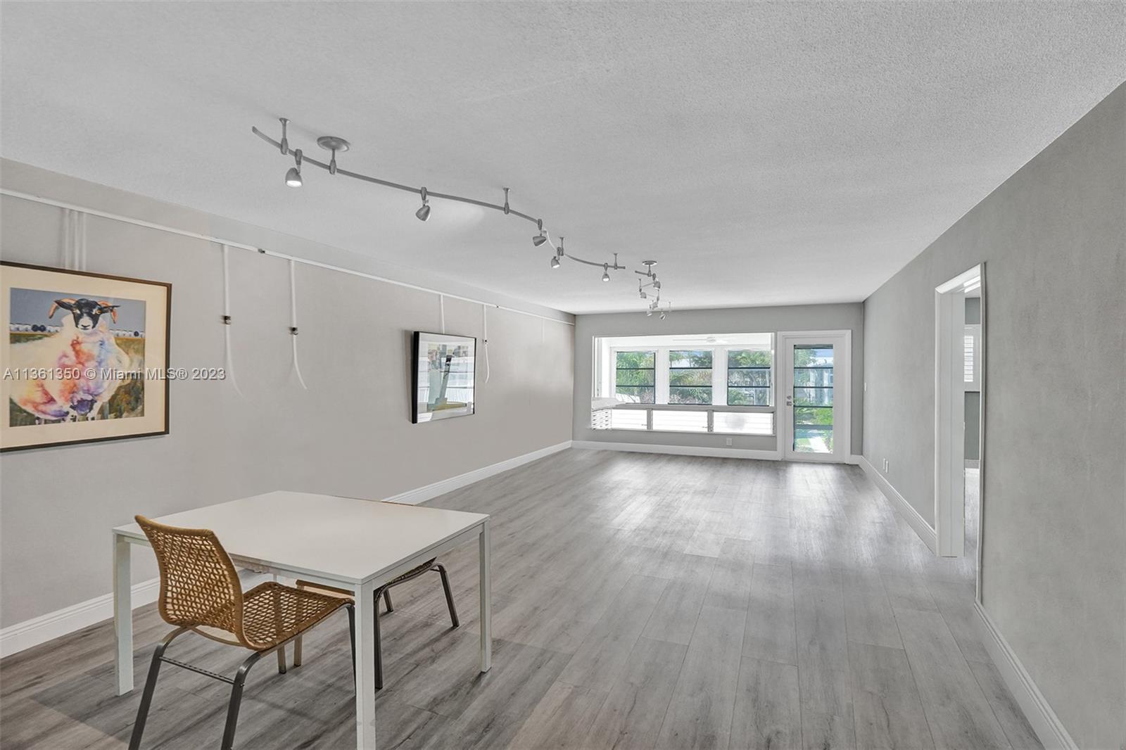 Welcome to Gated Community Rio Nuevo in Fort Lauderdale! This large 1bedroom-1.5bath condo is situated at prime location in the East side of town. This complex sits on one of the widest ocean access canals with no fixed bridges(community dock and dock rentals available). Come witness for yourself all the amenities, garden fields, and a clubhouse(with gym, pool table, ping-pong, shuffle-board, water views, gas grills, and more.) Extremely well maintained. The property also has new floors, remodeled bathrooms, 2 huge closets, and hurricane impact windows. Brand new permitted Electric Panel. Newer AC system works perfectly. You can't beat this type of deal! Bike to restaurants, Las Olas, shopping and most importantly to the beach! Included is a covered parking space and storage room!
