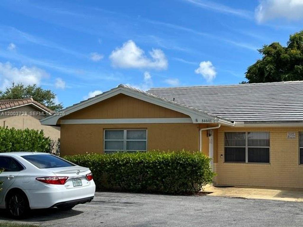 Photo of 8444 NW 23rd Mnr #E, Coral Springs, FL 33065 (MLS # A12003723)