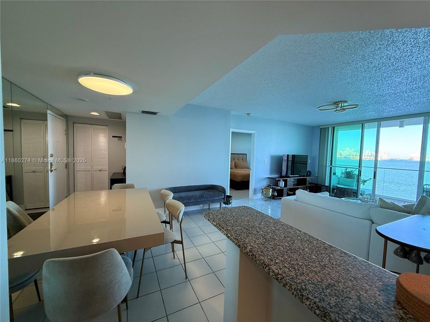 Experience luxury living in the heart of Brickell Key with this stunning, fully furnished 2-bedroom residence featuring a desirable split floor plan and spectacular ocean views. The home boasts a modern kitchen with stainless steel appliances, granite countertops, and stylish light fixtures. Enjoy your morning coffee or evening sunset from your private balcony overlooking the water. This move-in-ready unit includes one assigned parking space. The building offers resort-style amenities including a swimming pool, BBQ area, social room, sauna, valet, covered parking, and on-site management. With unmatched views and a prime location, this is Brickell Key living at its best!