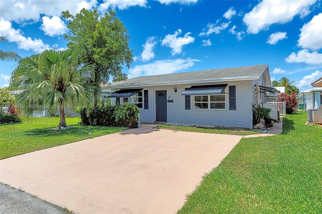 Photo of 8521 NW 57th Ct, Tamarac, FL 33321 (MLS # A12024192)