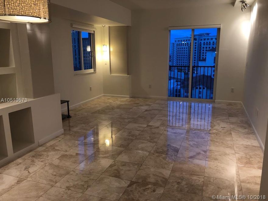Beautiful condo in the heart of Coral Gables. Move in ready, marble floors, custom wall units, upgraded bathrooms. Steps from the new pedestrian walkway in Giralda Ave and Miracle Mile. Enjoy the exquisite life Coral Gables offer. This fantastic building offer a great location yet privacy and comfort to the residents with an intimate lobby, Concierge, Pool, Gym, Spa and Party Room.
