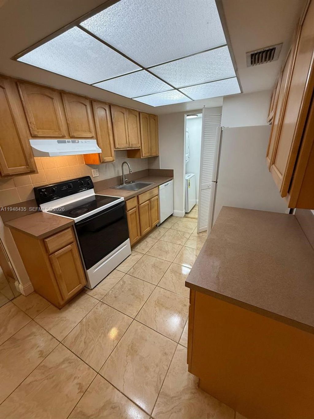 Photo of 5811 NW 21st St #20-B, Lauderhill, FL 33313 (MLS # A11948435)