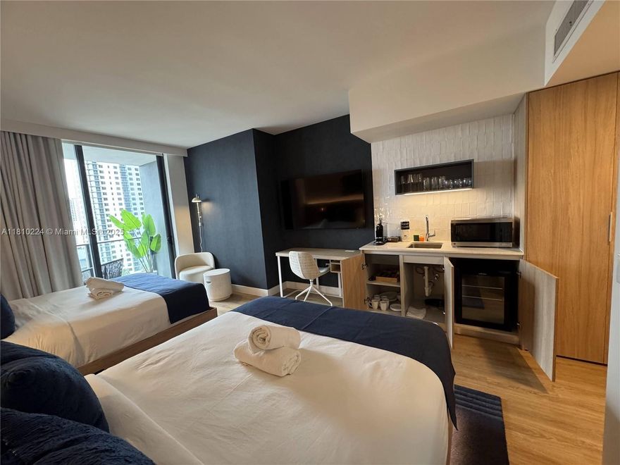 A remarkable investment opportunity awaits at Gale Residences in Downtown Miami. This fully furnished, modern studio is designed with sleek finishes and high-end details, perfect for generating income. Enjoy access to 70,000 sq. ft. of luxurious amenities, including a rooftop pool, fitness center, restaurants, and more. Situated in a prime location, just steps from Kaseya Center, Bayside, Brightline, and Miami's vibrant dining, shopping, and cultural scenes. This unit offers the flexibility to rent short-term-daily, weekly, or monthly. While not currently in the hotel program.