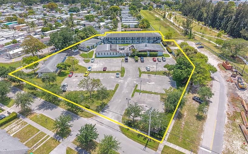 Incredible covered land or redevelopment opportunity in the heart of NW Miami. This 1.97-acre RU-2 zoned site includes 20 residential units (24 beds/18 baths) plus a large structure currently used as a church. Ideal for end-users, affordable housing developers, or mission-aligned groups. Strong land comps support value. Infill location with utilities in place and access to major corridors. Unit mix includes 1BR and 2BR apartments. Shown by appointment only. Do not disturb occupants.
