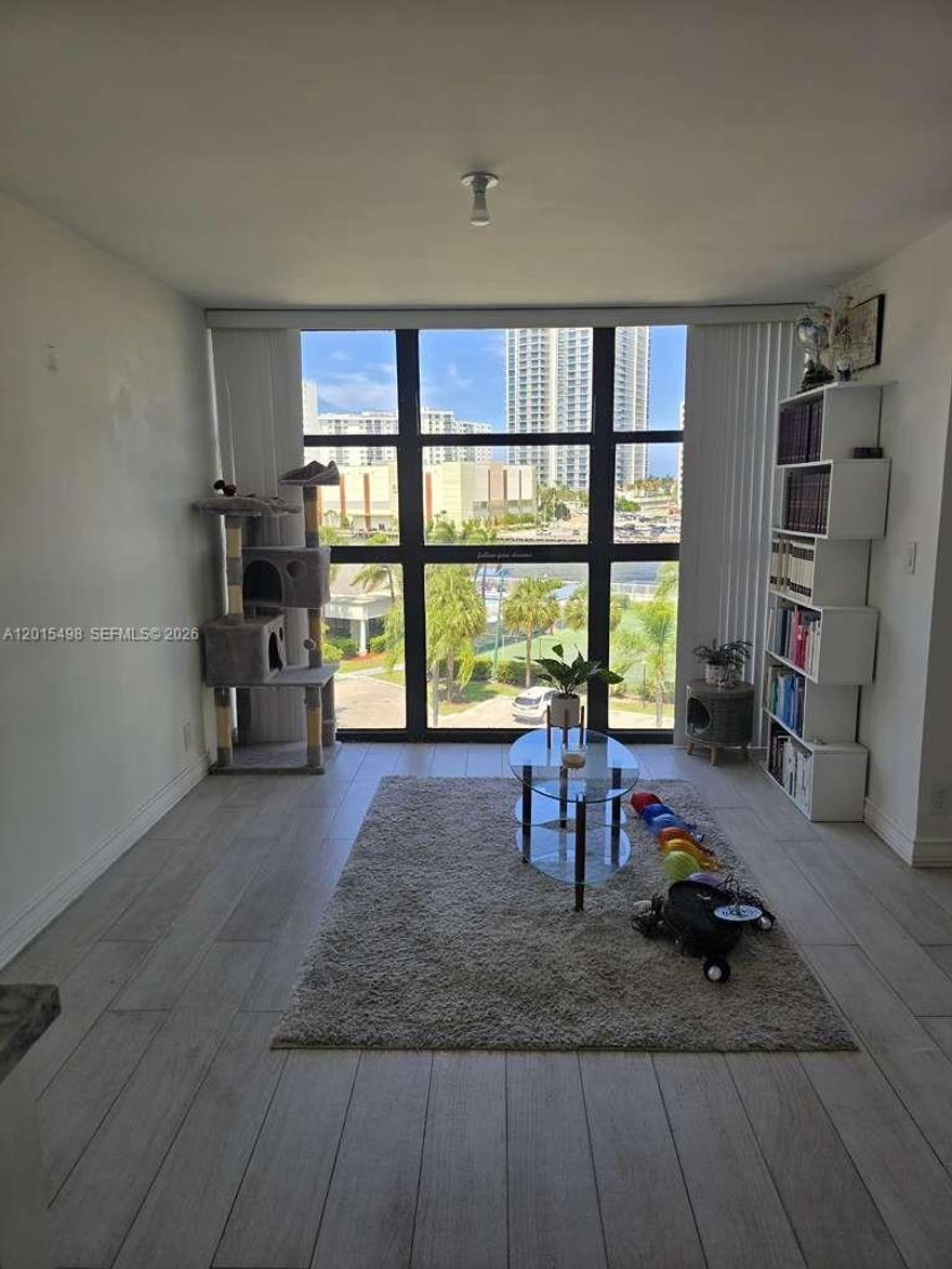 Welcome to this beautifully maintained 11-story building in the heart of Hallandale Beach! Perfectly located just minutes from the beach, shopping, dining, schools, and Hollywood Beach Blvd, this property offers the ideal South Florida lifestyle with convenience right at your doorstep. Enjoy being within walking distance to stores, shops, and everyday essentials while still living in a peaceful and secure community.

The building features an impressive list of amenities including a beautifully landscaped courtyard, resort-style pool, sauna, fitness center, library, tennis courts, multiple indoor and outdoor party rooms, and plenty of parking for residents and guests. The lobby is secured with on-site security, offering comfort and peace of mind. Visitor parking is also available for added convenience.

Inside, the unit features a beautifully renovated kitchen with modern finishes, wall oven, refrigerator, and a spacious layout designed for comfortable living. Enjoy a large walk-in closet and breathtaking views overlooking the water, pool area, and tennis courts. Natural light fills the space, creating a bright and inviting atmosphere throughout.

Whether you are looking for a primary residence, seasonal getaway, or investment opportunity, this property combines location, amenities, security, and lifestyle all in one exceptional Hallandale Beach community.