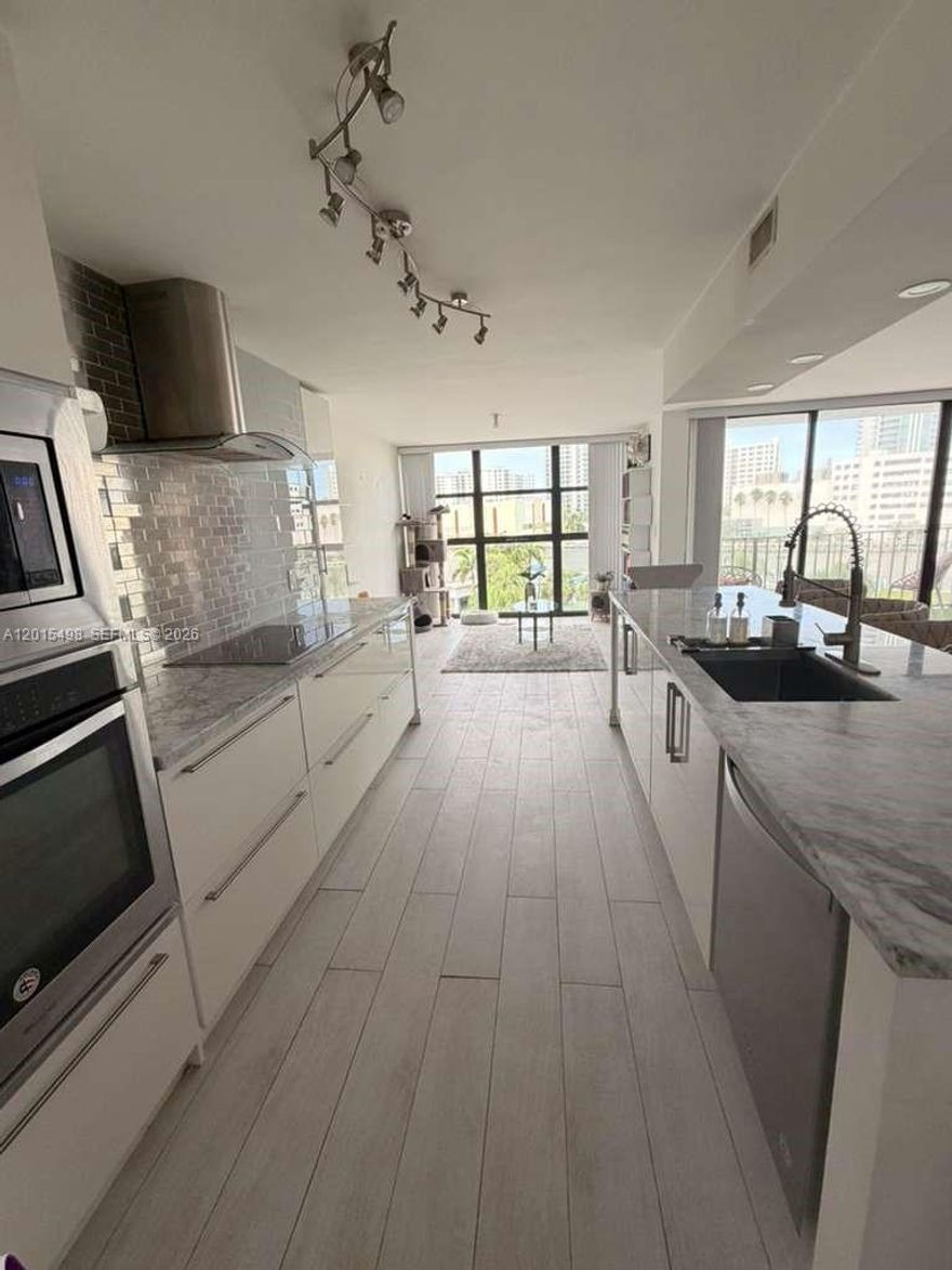 Welcome to this beautifully maintained 11-story building in the heart of Hallandale Beach! Perfectly located just minutes from the beach, shopping, dining, schools, and Hollywood Beach Blvd, this property offers the ideal South Florida lifestyle with convenience right at your doorstep. Enjoy being within walking distance to stores, shops, and everyday essentials while still living in a peaceful and secure community.

The building features an impressive list of amenities including a beautifully landscaped courtyard, resort-style pool, sauna, fitness center, library, tennis courts, multiple indoor and outdoor party rooms, and plenty of parking for residents and guests. The lobby is secured with on-site security, offering comfort and peace of mind. Visitor parking is also available for added convenience.

Inside, the unit features a beautifully renovated kitchen with modern finishes, wall oven, refrigerator, and a spacious layout designed for comfortable living. Enjoy a large walk-in closet and breathtaking views overlooking the water, pool area, and tennis courts. Natural light fills the space, creating a bright and inviting atmosphere throughout.

Whether you are looking for a primary residence, seasonal getaway, or investment opportunity, this property combines location, amenities, security, and lifestyle all in one exceptional Hallandale Beach community.