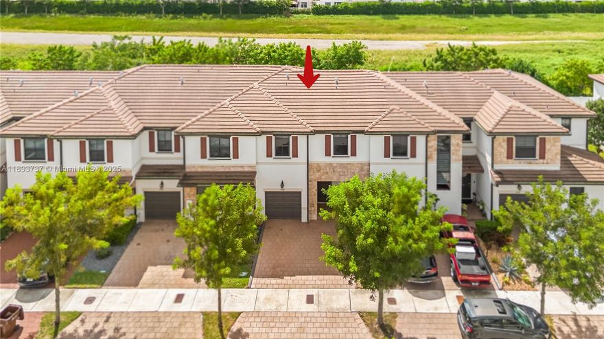 Best price for this model in Aquabella! One of the most spacious and functional Townhome models, offering the feel of a single-family home with an open layout, a modern kitchen featuring a small island, tile floors downstairs, and laminated wood upstairs. The bedrooms are generously sized, providing comfort and space for everyone. The property includes a one car garage plus three additional parking spaces on the driveway. Located in the highly desirable Aquabella community, residents enjoy resort-style amenities such as two clubhouses, swimming pools, fitness center, playgrounds, and social areas. Perfectly situated near major access roads, supermarkets, shopping centers, schools, and more