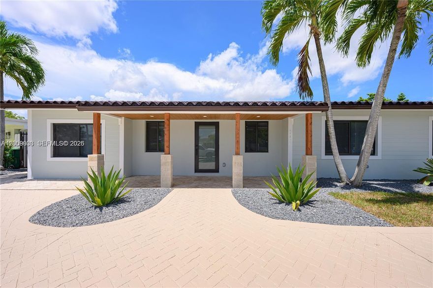 Beautifully renovated modern canal-front pool home in the highly desirable Southern Estates area! This move-in ready residence features a spacious open-concept layout filled with natural light, elegant finishes, and stylish upgrades throughout. The gourmet kitchen offers custom cabinetry, quartz countertops, stainless steel appliances, and an oversized island perfect for entertaining. The expansive primary suite includes a walk-in closet and a luxurious marble en-suite bath with dual vanities, spa tub, and glass-enclosed shower. Additional highlights include impact windows and doors for added security and efficiency. Step outside to your private backyard oasis with sparkling pool, low-maintenance turf, and tranquil canal views. Conveniently located near the Florida Turnpike, major hospitals, shopping, dining, and schools. A rare turnkey gem!