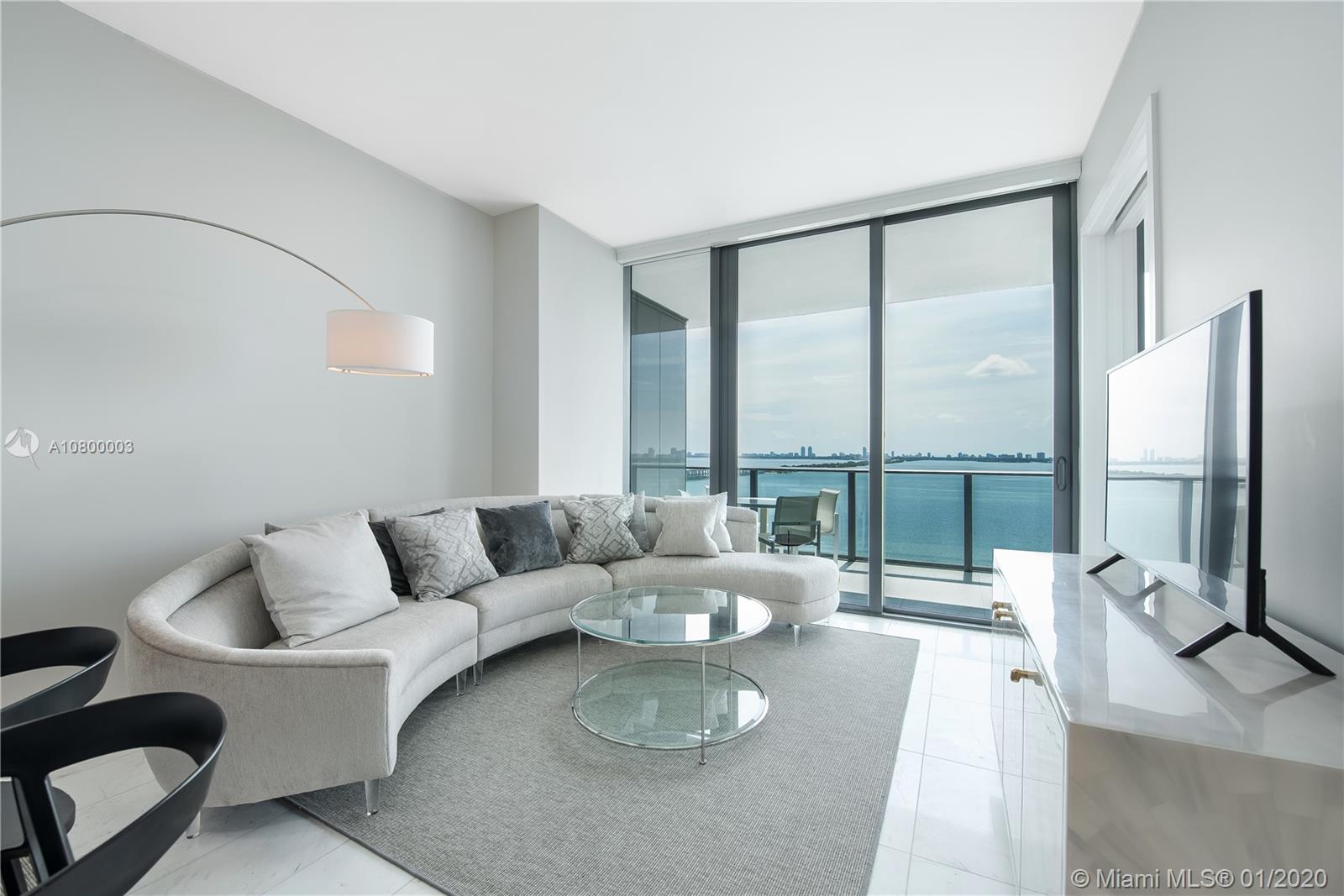 Edgewater Waterfront Luxury! Private entrance, fully & beautifully furnished, teo bedrooms + den with endless bay views, sunrise & sunset views. 10 ft. ceilings, carrara marble flooring throughout, electric blinds, custom closets, Wolf and Sub Zero appliances. Miami's most incredible amenities featuring a full-service spa, bowling alley, fitness center, tennis, virtual golf room, movie theatre, wine & cigar cellars, and world-class dining and beach club on site.