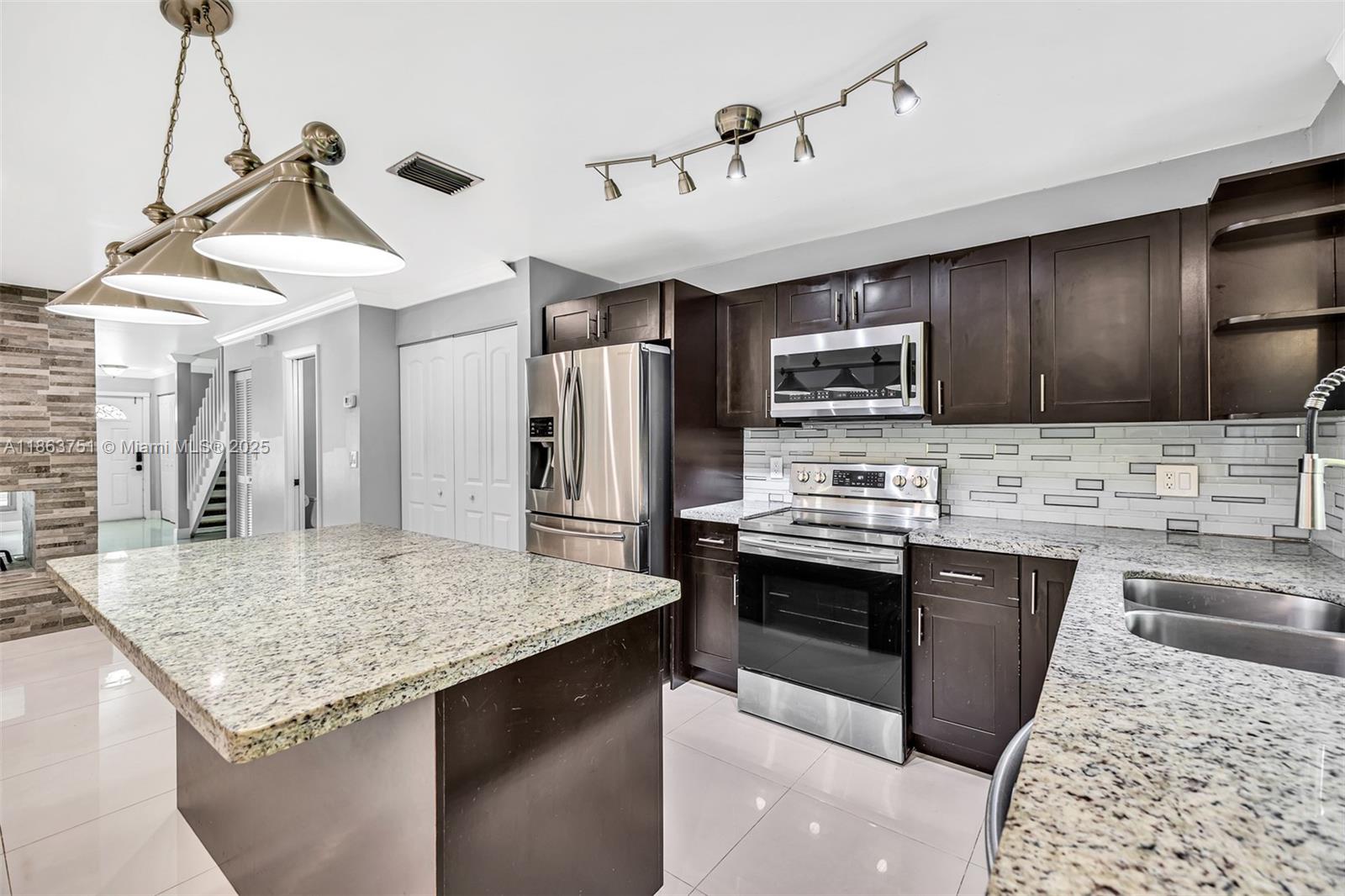 Fully renovated Corner unit townhouse in the heart of Coral Springs. Newer kithchen and bathrooms. Impact grade windows and doors. Working Fire Place. All bedrooms located on the 2nd floor. All special assessments have been already paid in full by the seller.