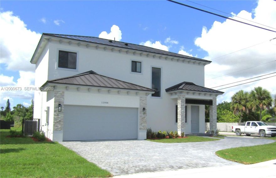 Beautiful Eluthera model built by Mountain Cove in 2023. Single family home, 2 story 4-bedroom, 3-bathroom. Main bedroom with doble walking closet and the other 3 also offer nice and spacious walking closets. This model has a bedroom and full bathroom on first-floor level. Features: metal roof, 20 x 20 tiles throughout the general areas, granite countertops, stainless steel appliances, high-efficiency tankless water heaters, Zebra blinds, impact windows and doors, completed fenced, and beautiful landscaping. NO HOA or CDD fees. Additionally, spacious Doble car garage with a circular drive way and space for plenty cars. Space for boat, RV, truck, and more. Great location, close to Publix, restaurant, US1, Turnpike. A+ schools.