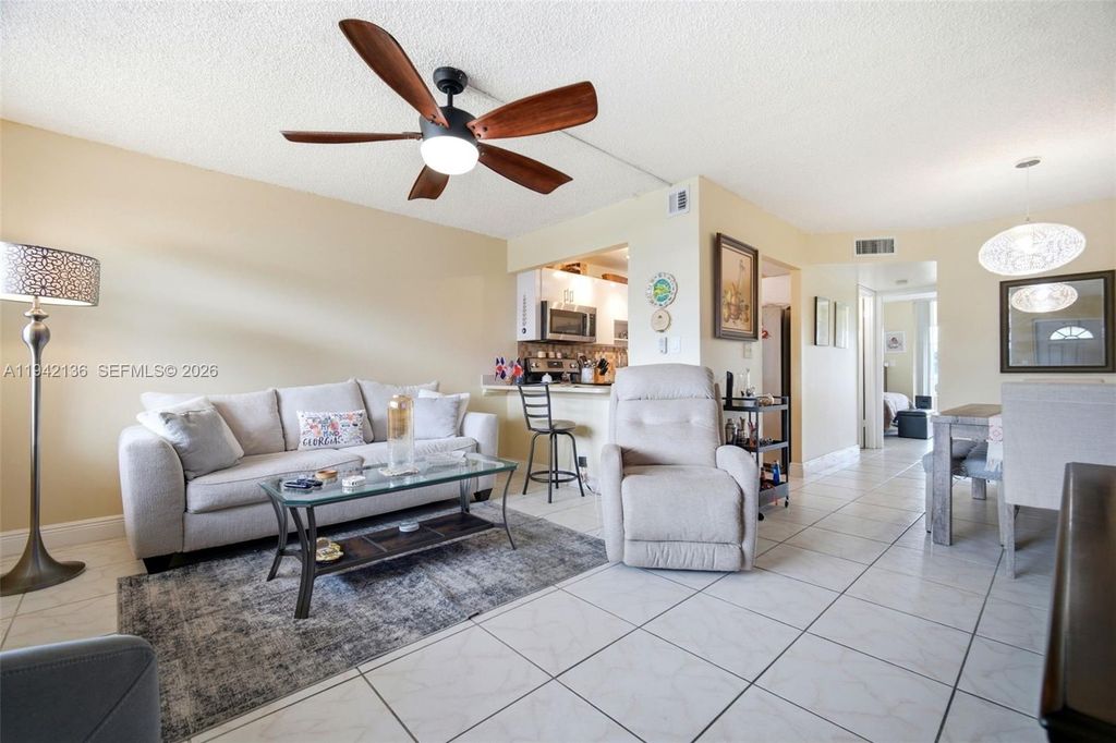 Photo of 9121 Sunrise Lakes Blvd #114, Sunrise, FL 33322 (MLS # A11942136)