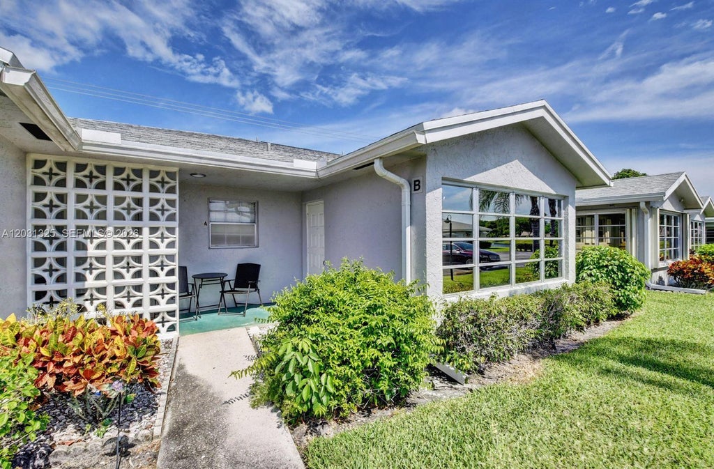 Photo of 14529 Canalview Dr #B, Delray Beach, FL 33484 (MLS # A12031325)