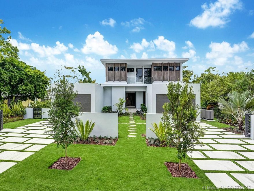 Exceptional Strang Design built as sellers' forever home in adored South Miami has just completed construction. This work of architectural art is an investment in longevity using materials of the highest quality, superior construction and embodies energy conscious technology.  All Binova imported Italian cabinetry throughout the impressive kitchen, custom bar, 8 bathrooms and independent guest pod. An intriguing 70-foot koi river flows in front of the tranquil waterfall wall and dreamy outdoor kitchen. Substantial 55-foot-long lap swimming pool. Elevated high above sea level this modern masterpiece has extra features like a full home generator, two Rinnai water heaters powered by unlimited natural gas and a SubZero midnight kitchen.  His and her garages may accommodate up to 8 vehicles.