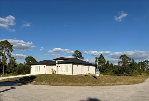Photo of 713 da Vinci Ave S, Lehigh Acres, FL 33974 (MLS # A12026862)