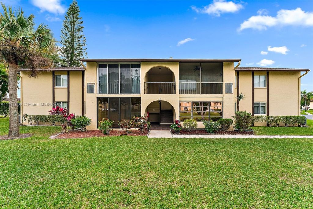 Photo of 310 Pine Ridge Cir #B-1, Green Acres, FL 33463 (MLS # A11512086)