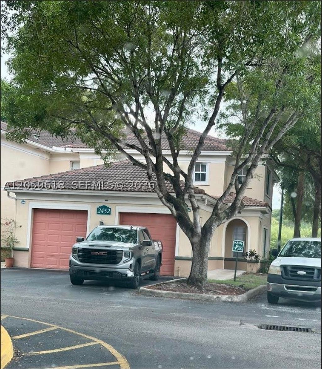 Photo of 2452 Centergate Dr #104, Miramar, FL 33025 (MLS # A12059618)