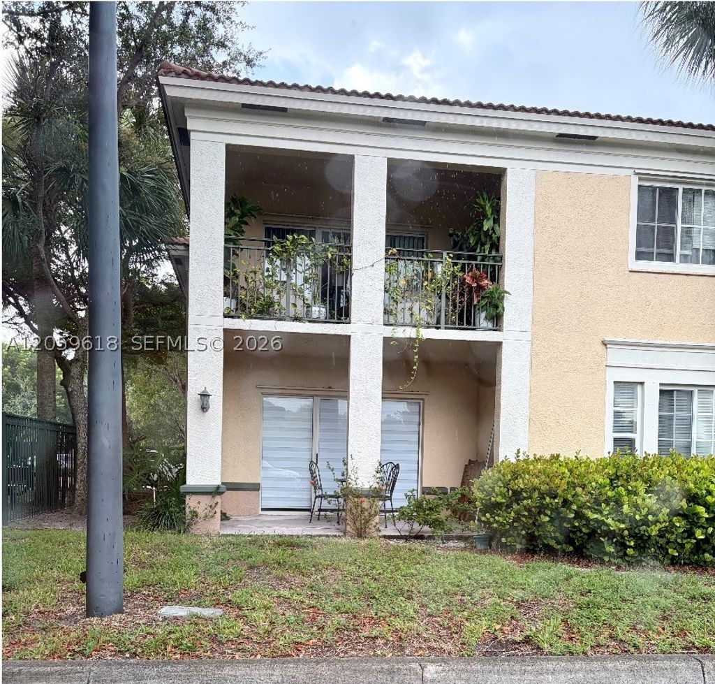 Photo of 2452 Centergate Dr #104, Miramar, FL 33025 (MLS # A12059618)