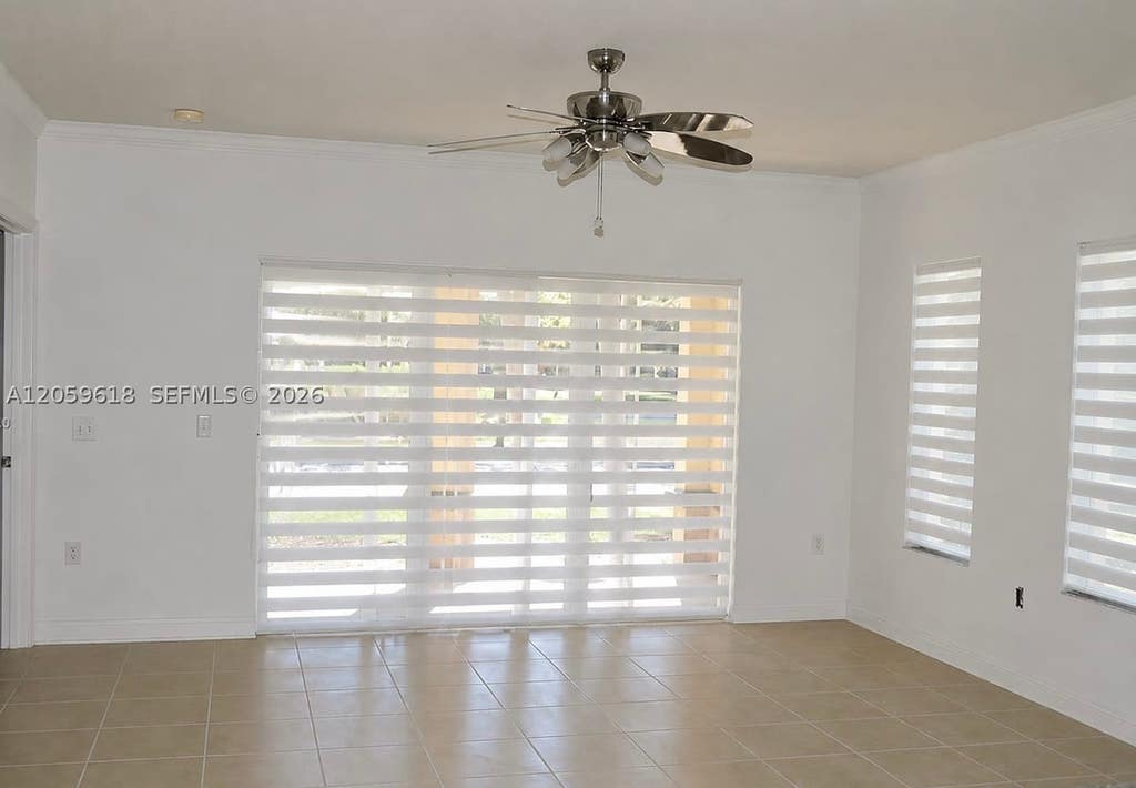 Photo of 2452 Centergate Dr #104, Miramar, FL 33025 (MLS # A12059618)
