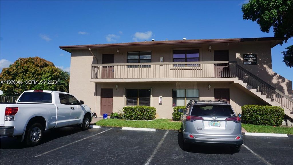 Photo of 10057 Winding Lake Rd #204, Sunrise, FL 33351 (MLS # A11976086)