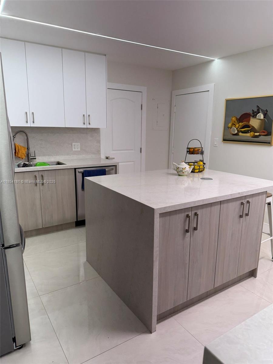 Beautifully remodeled just 8 months ago, this 1,789 sq ft first-floor corner unit features 3 bedrooms and 2 modern bathrooms—both with sleek walk-in showers. Enjoy serene canal and garden views from every angle.
The unit is fully tiled and includes a full-size washer and dryer. The open kitchen boasts stainless steel appliances, a large island perfect for entertaining, and stylish zebra blinds on all windows.
Available to move in October 1, 2025
Best value in the area for a move-in-ready property!