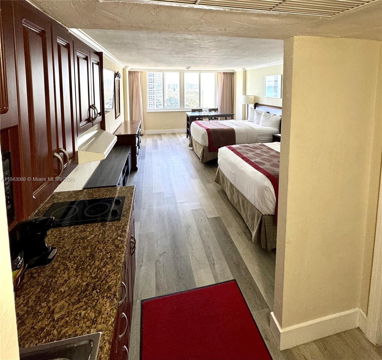 Own a Slice of Paradise in Sunny Isles Beach! This fully furnished condo offers direct beach access and the ultimate in flexibility—perfect for personal use or an investment property. The building offers onsite support to help secure guests when you're away. Inside, you'll find impact windows, laminate flooring, kitchenette, dining area & two queen size beds. HOA dues include water, electricity, basic cable, and Wi-Fi. Enjoy resort-style amenities such as a remodeled pool, pool bar, full beach service, café, laundry facilities and shops.
Monthly Maintenance fee is $1798.51 (maintenance fee: $1,273.28, Reserves: $163.03, Special Assessment: $362.20). Total amount of Special Assessment is $43,464.26, to be paid over ten years, ending October 2034.