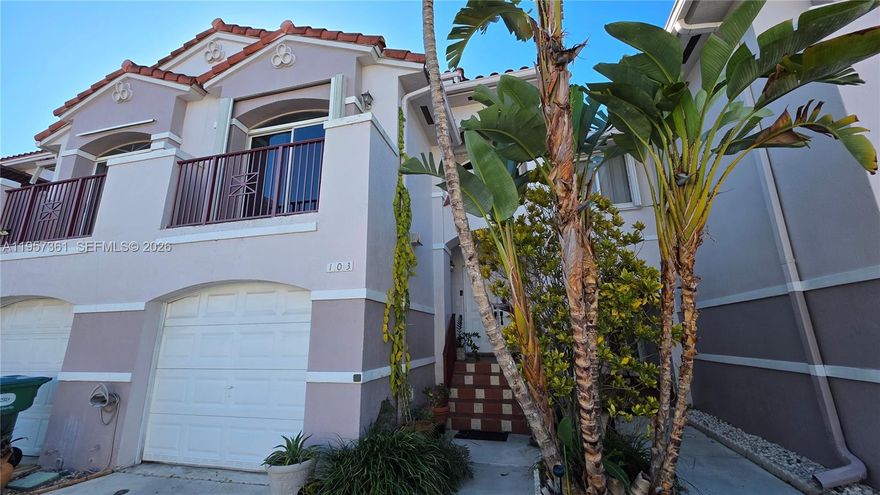 Gorgeous and fully updated 3-bedroom, 2.5-bathroom home with serene lake views, located in the highly desirable Hammocks community. This unique three-story residence features a one-car garage and impact windows throughout. The first floor offers a spacious primary suite with a sitting area and a beautifully updated primary bathroom featuring dual sinks and a shower. The second floor showcases an open-concept living and dining area, an updated kitchen, and elegant marble floors, along with both front and back balconies overlooking the patio and the lake—perfect for relaxing or entertaining. The third floor includes two additional bedrooms and a versatile open space ideal for a studio, office, or den. Enjoy a good-sized fenced patio with a porch and terrace, ideal for outdoor living. The Hammocks community offers resort-style amenities, including a large lake with a 5-mile walking and biking trail, small beach areas, swimming pools, tennis courts, and a gym. A must-see home—you will absolutely love it!