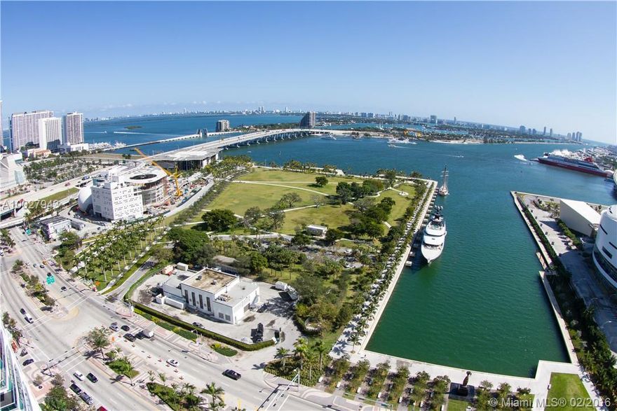 Live in the heart of Downtown Miami! Unit comes with custom tile floors, stainless steel appliances, washer/dryer, custom master closet & TWO parking spots! Enjoy breathtaking bay, ocean & sunset views, plus lux amenities including two pools, hot tub, fitness center, beach volley ball & more. 24 hour security. Across the street from the American Airlines Arena, Adrienne Arsht Center, Perez Art Museum. 10min to SoBe, Brickell and Midtown.