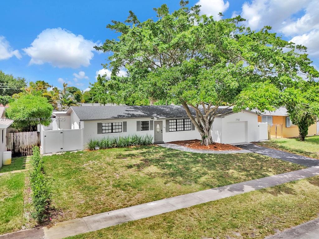 Welcome to this beautifully renovated 3-bedroom, 2-bathroom home in the heart of Pembroke Pines, close to everything you could need!, ideally situated close to I-95 and the Turnpike for easy commuting. This spacious residence boasts a modern interior with a dedicated laundry room, an attached garage, and a refreshing pool for those sunny Florida days. The property also features a completely private efficiency unit, which is not included in the rent. New fence, new roof, recently renovated, ready for a new family!.