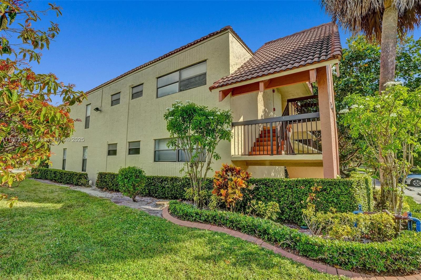 Large, beautiful and well kept 2/2 unit located at the HAMMOCKS LAKE FOREST CONDOMINIUM in Coconut Creek. The unit has a large kitchen with plenty of cabinet space, stainless steel appliances, tile flooring throughout the living areas and carpet in the bedrooms. Spacious bathrooms. Master bedroom has a huge walk-in closet and bath tub. Large screened-in balcony with a pleasant view of trees that provide privacy. Full size washer and dryer inside the unit. Two assigned parking spaces for the unit.