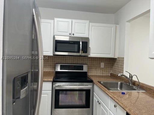 Photo of 540 SE 2nd Ave #J3, Deerfield Beach, FL 33441 (MLS # A12085284)