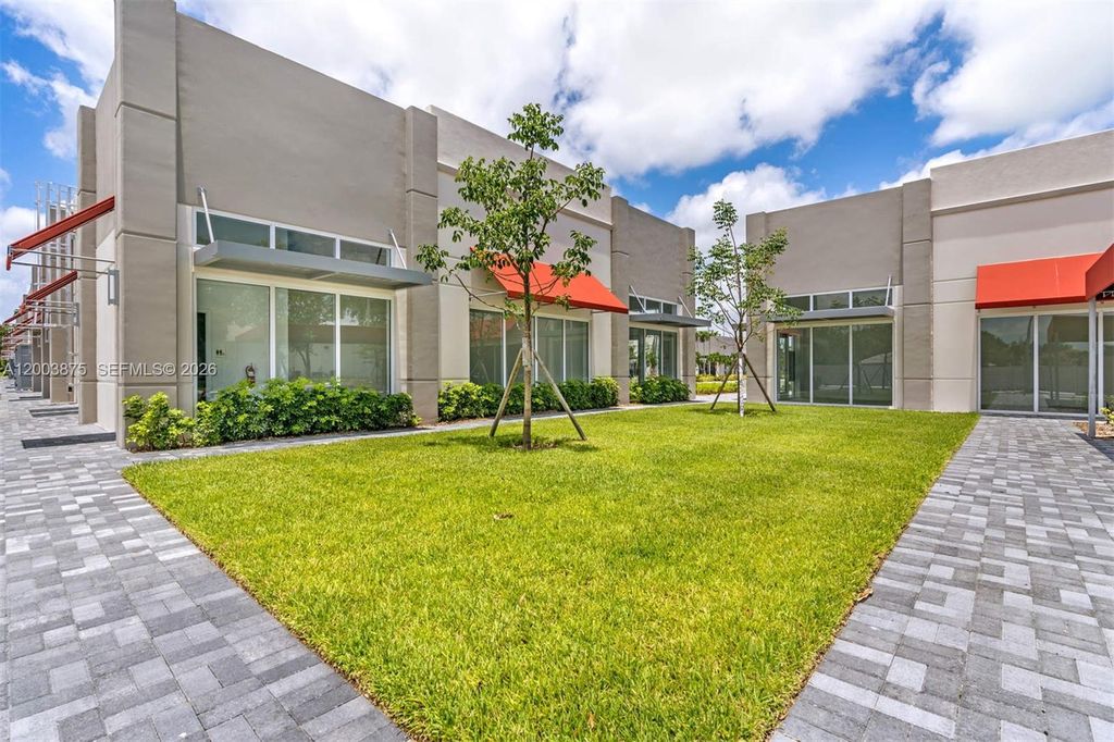 Photo of 9620 Stirling Rd #101, Cooper City, FL 33024 (MLS # A12003875)