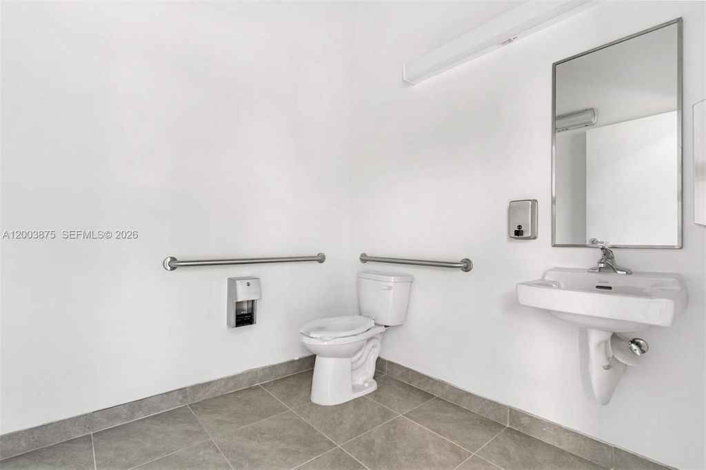 Photo of 9620 Stirling Rd #101, Cooper City, FL 33024 (MLS # A12003875)