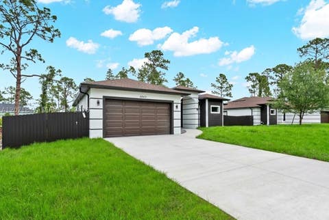 Photo of 1047 Merry St, Lehigh Acres, FL 33974 (MLS # A12071847)