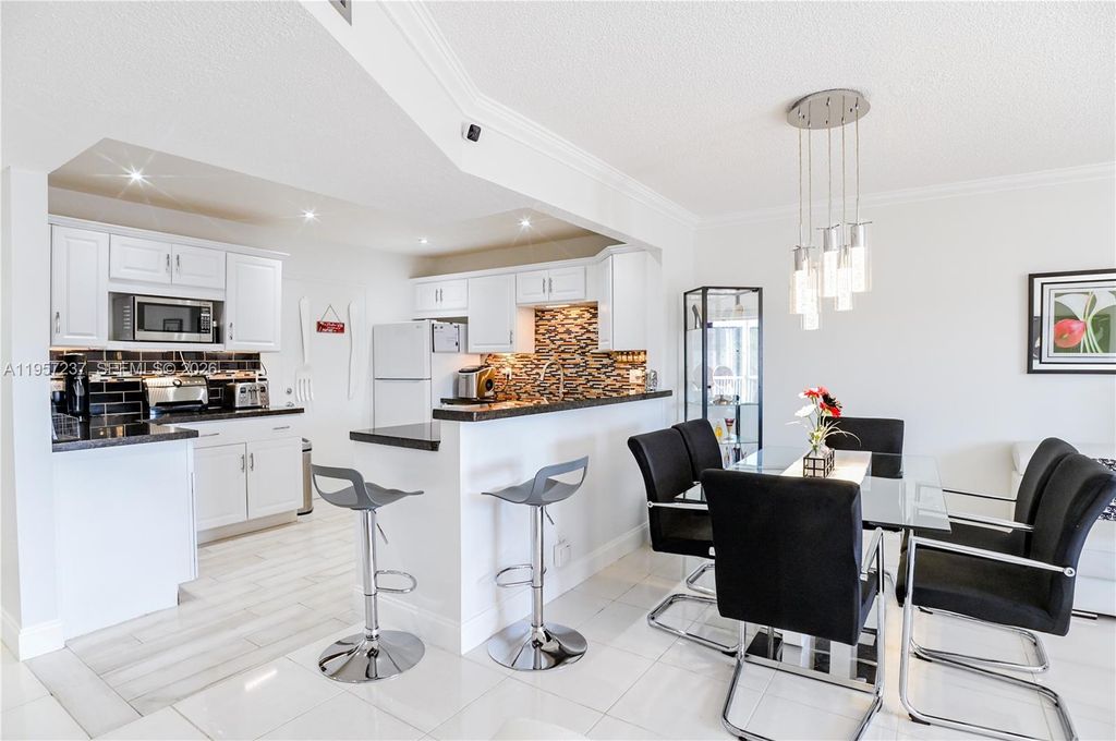 Photo of 4751 NW 21st St #401, Lauderhill, FL 33313 (MLS # A11957237)