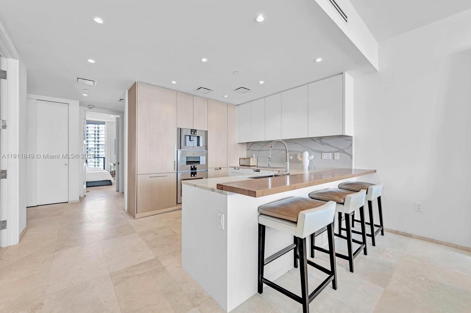 15701 COLLINS CONDO - Residential Lease