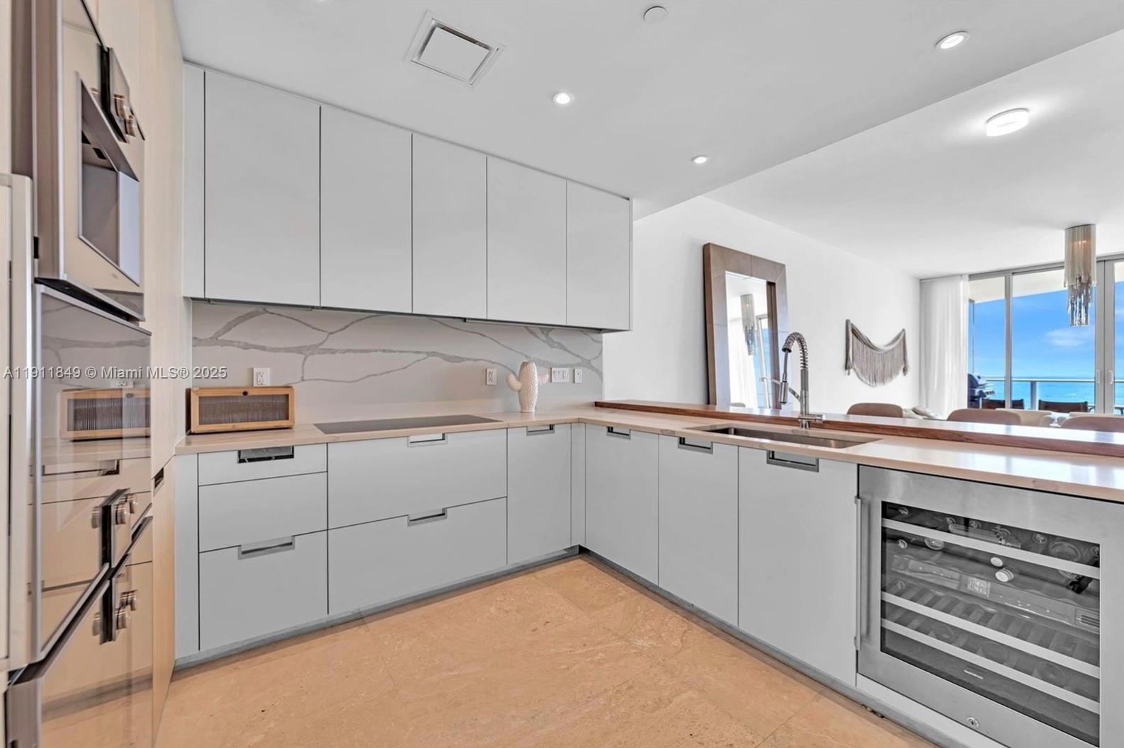 15701 COLLINS CONDO - Residential Lease