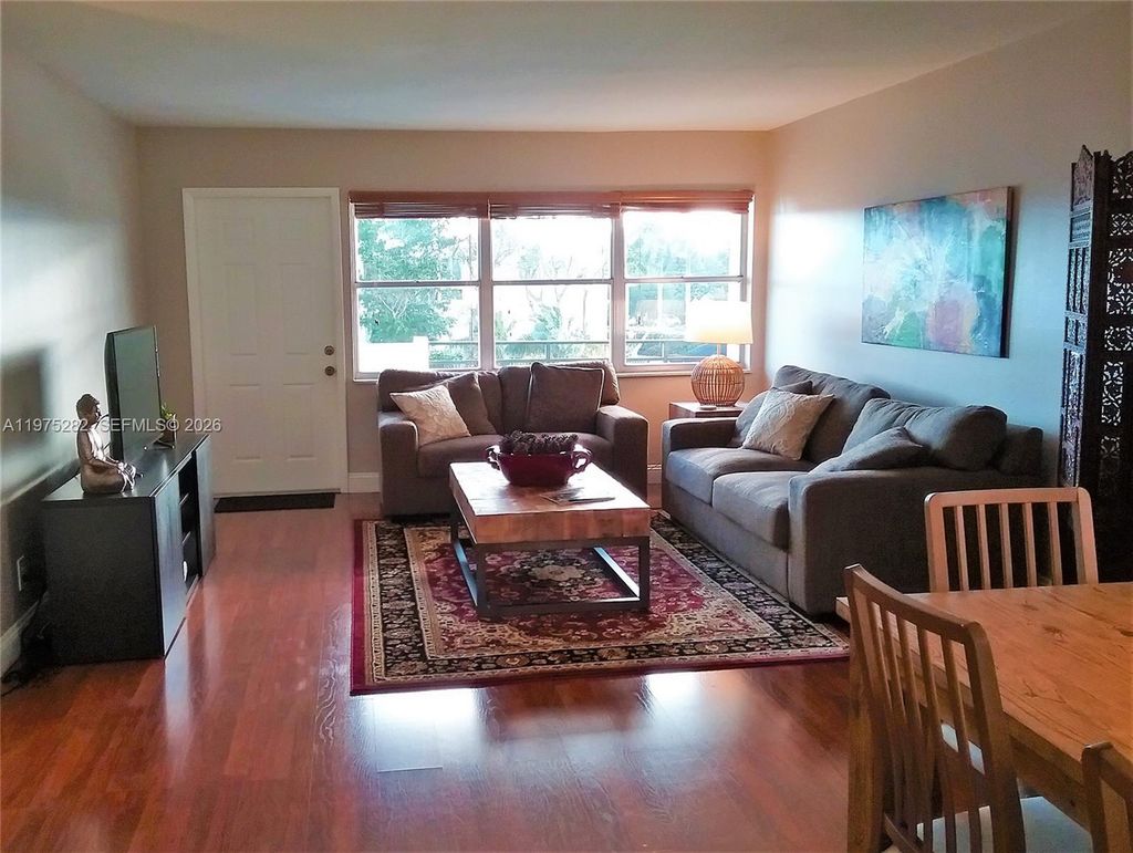 Photo of 401 Golden Isles Dr #208, Hallandale Beach, FL 33009 (MLS # A11975282)