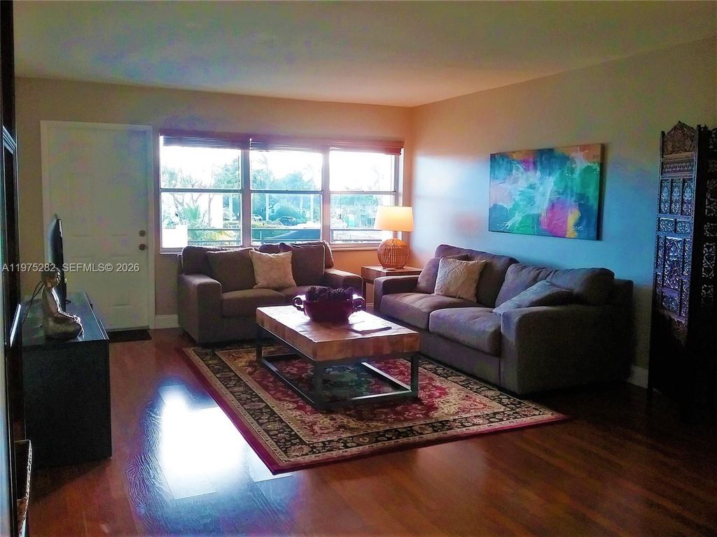 Photo of 401 Golden Isles Dr #208, Hallandale Beach, FL 33009 (MLS # A11975282)