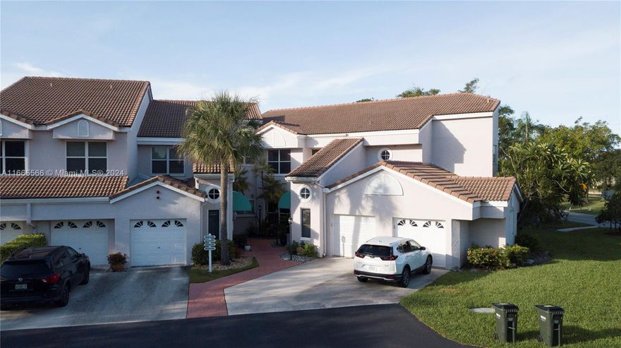A rarely available condo/townhome in the heart of Pembroke Pines, located inside the exclusive gated 27-hole championship golfing community of Grand Palms. 
This tastefully renovated corner unit features three bedrooms, 2 1/2 bathrooms, travertine floors, a very convenient one car garage and screened patio overlooking the tropical garden and lake. The move in ready unit is an ideal setting for those desiring a private lifestyle. 
Cruise in your golf cart and enjoy the pristine greens, take a stroll, or ride your bike within the safety of the community. 
Easy access to major highways, dining, schools, parks and entertainment. Short drive to both MIA and FLL international airports, beautiful beaches, world class shopping and the cosmopolitan cities of Miami and Fort Lauderdale.