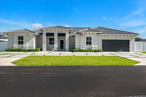 Photo of 19803 SW 321 Street, Homestead, FL 33030 (MLS # A12079423)