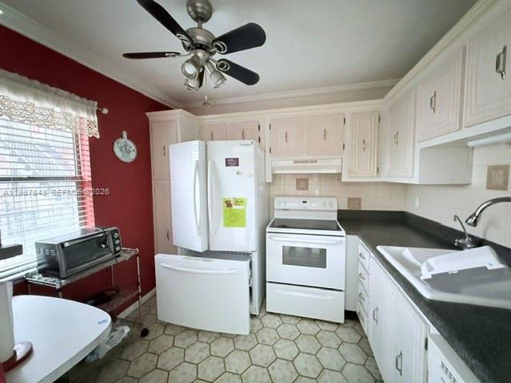 Photo of 2841 Somerset Dr #305, Lauderdale Lakes, FL 33311 (MLS # A11987848)